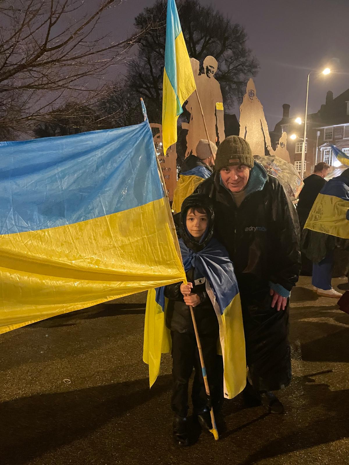 Paul Smith with young boy and Ukraine flag